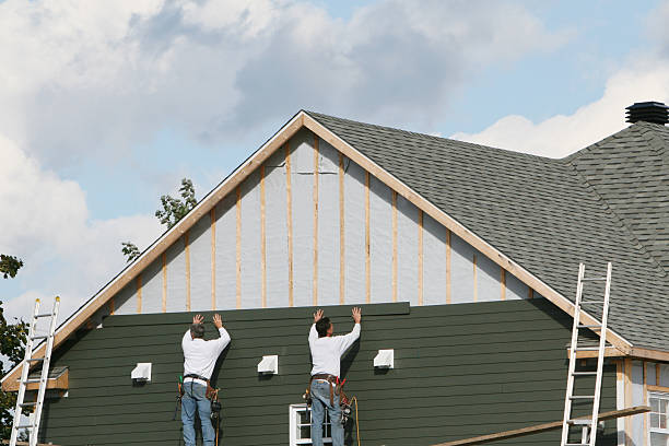 Professional Emergency Siding Repair technician working in Hallwood, VA